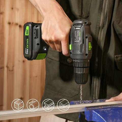 Person using Cordless Drill Driver And Impact Driver Kit With 1.3Ah Battery on a metal surface indoors.