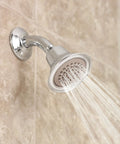 3.5 Inch Single Function Eco-Performance Shower Head 6303EPBN Brushed Nickel Finish spraying water in bathroom