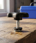 Pro Grade Star Hand Knob With Threaded Adjustment Handle Set on wooden surface