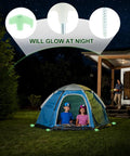 Glow In The Dark Spiral Tent Pegs 10 Pack Steel Stakes with hammer, rope, and carry bag securing a tent at night