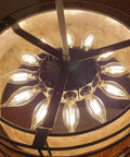 Close-up of lit chandelier using Phenolic Candelabra Socket E12 Base With 1.25 Inch Shoulder And Screw Ring, 8 Inch Wire Leads.
