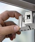 Person installing 316 Stainless Steel Heavy Duty Hinge With Broad Mounting Plates Polished Finish for sunroom roofs.