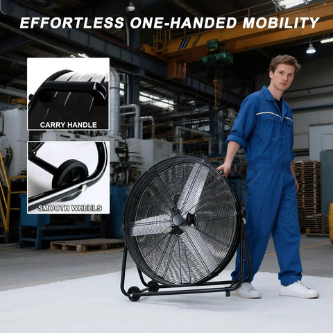 24 Inch Industrial Floor Fan High Velocity Drum Fan Delivers 8900 CFM With Three Speeds Portable Beastly Heavy Duty Air Cooling For Warehouse, Workshop, Factory, Commercial, Residential And Greenhouse Black with carry handle and wheels in a factory setting