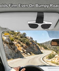 Slick Magnetic Leather Sunglass Holder For Cars That Snaps Right Onto Your Visor, holds sunglasses securely while driving.