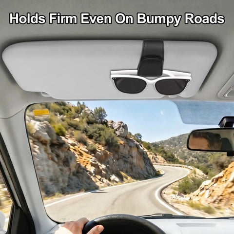 Slick Magnetic Leather Sunglass Holder For Cars That Snaps Right Onto Your Visor, holds sunglasses securely while driving.