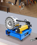 Beast Of A Handheld Hydraulic Hose Crimper With 8 Interchangeable Dies displayed on a workbench in a garage setting