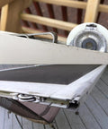 Close-up of Heavy Duty Gliding Screen Door Roller Assembly with nylon wheels and metal track used for replacement on patio sliders.