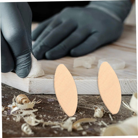 Hands applying finish to wood surface with Real Deal Hardwood Biscuits 100 Pack Precision Joiner Slots beside.