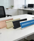 Textured Aluminum Name Plate Holders For Wall And Desk in black, silver, gold, rose gold on office desk angle view
