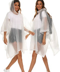 Two women wearing 2 Pack Reusable Adult Rain Ponchos Emergency Waterproof Rain Coat With Drawstring Hood Heavy Duty EVA Gear Tear Resistant Quick Dry.