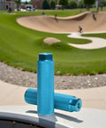 Two Blue Aluminum Alloy Anti Skid BMX Bike Pegs for Mountain Bikes Universal Fit Three Eighths Inch Axles Rear Durable Gnarly Knurled Grip for Stunts and Tricks on a park background
