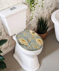 Round Luxury ornate for creating textiles paper Print gold Toilet Seat on white toilet in a stylish bathroom setting.