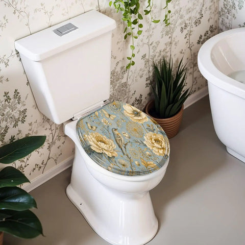 Round Luxury ornate for creating textiles paper Print gold Toilet Seat on white toilet in a stylish bathroom setting.