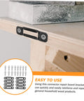 50 Pack Tough As Nails Manganese Steel Furniture Connectors Lock Down Cabinets And Wardrobes With Invisible Hardware showing matte black bracket on wood