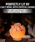 Natural Pink Salt Lamp Bowl With Crystal Chunks For Air Purification And Calming Ambiance glowing in a cozy room setting