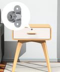Rock Solid Zinc Alloy Push Plunger Cabinet Lock Set Keyed Alike Four Pack Smooth Chrome Finish installed on a modern desk drawer.