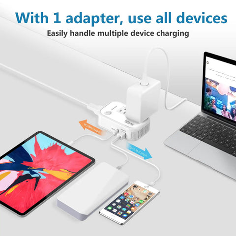 Travel Voltage Converter 220V To 110V With 4 USB Ports And Universal Plug Adapter, powering devices on desk.