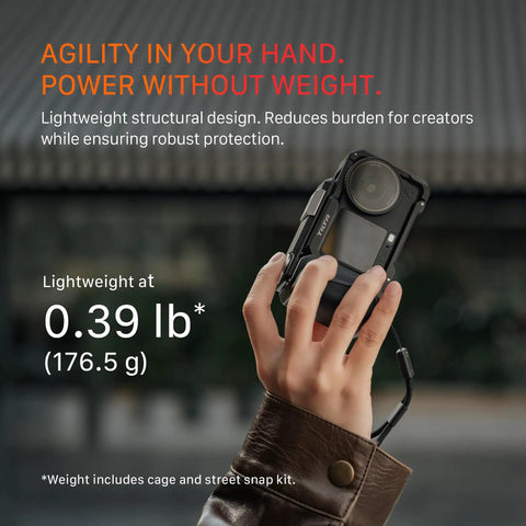 Hand holding DJI Osmo Action 6 Street Snap Kit Camera Cage with Quick Release Hand Grip, showing lightweight 0.39 lb.