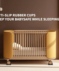 Rectangle Rubber Caster Cups No Slip Furniture Pads 8 Pack 2.9 By 2.3 Inches Anti Slip Grippers That Stop Sliding Wheel Stoppers For Rolling Furniture Black under a yellow crib in a nursery.