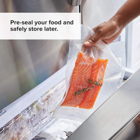 Precision Vacuum Sealer Bags Pre Cut 8.6 By 11.8 Clear Easy Tear Tops Pack Of 50 with salmon inside shown being frozen