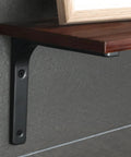 Close-up of 4 Pack Iron Wall Shelf Brackets 4 x 4 Inch Heavy Duty Shelf Support in matte black with wooden shelf installed