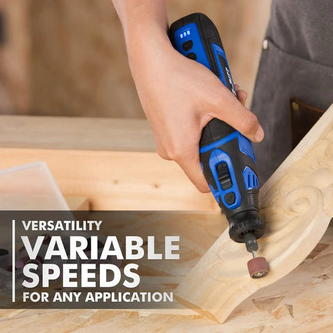 Person using 8V Cordless Rotary Tool Kit with 130 Pcs Accessories on wood carving; 5 speed, 30000 RPM, for sanding and detail work.