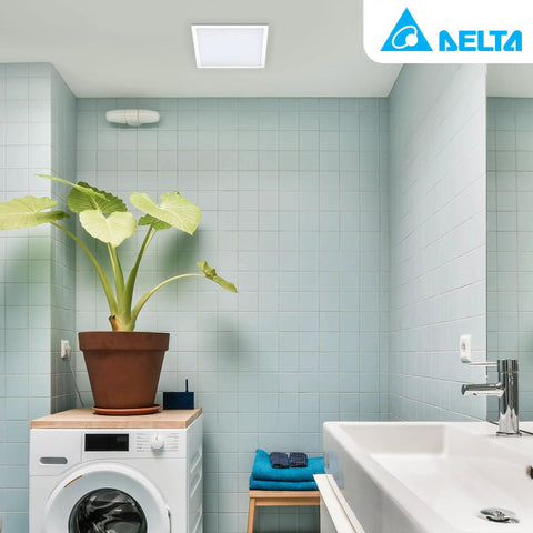 Image of a bathroom with a 100 CFM Bathroom Exhaust Fan With Edge Lit Dimmable LED Light on the ceiling, next to a potted plant.