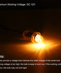 Works Like A Charm E10 Screw Base Miniature Bulbs 12V 5W Warm Yellow Light illuminating with clear glass dome design.