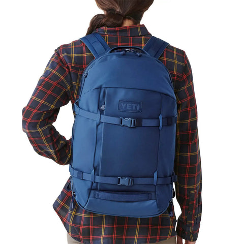 Person wearing Crossroads 27L Everyday Backpack Built With Durable TuffSkin Nylon And 700D Material For Commuters And Weekend Warriors