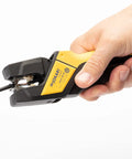 Hand holding Sensor Wire Stripper For Sensor Cables And Secure Cabling No Diameter Adjustments Needed Pro Grade Tool From German Engineering