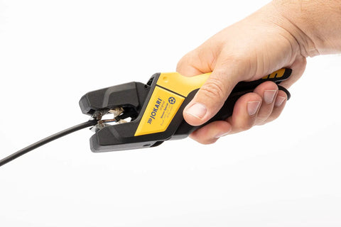 Hand holding Sensor Wire Stripper For Sensor Cables And Secure Cabling No Diameter Adjustments Needed Pro Grade Tool From German Engineering
