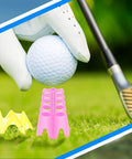 Close-up of golfer placing ball on multicolor plastic tees from 30 Piece Golf Tees Set For Home Indoor Outdoor Practice.