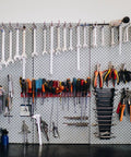 Compact Twenty Piece Wrench Set With Metric And SAE Sizes on pegboard, includes open end and combination wrenches, storage ready.