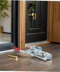 Premium Heavy Duty Toggle Latch Clamps Set Of 2 With Stupendous 2183 Lb Hold Power on a wooden floor by a door.