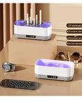 Portable Ultrasonic Cleaner With Rechargeable Battery For Jewelry And Watches One Touch Control on a table with a watch and tools.