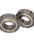 Two chrome steel double-shielded ball bearings, bore 1/2 in, OD 1-1/8 in, width 5/16 in.