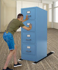 Person moving a tall blue filing cabinet using Two Pack Large Furniture Sliders With Pull Straps For Easy Move Heavy Duty Appliance Sliders.