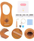 7 String Lyre Harp Starter Kit With Tuning Wrench Extra Strings And Music Sheet Book displayed with accessories.