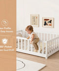 White Full Rubber Wood Floor Bed With Safety Guardrails And Fence Door in room with child climbing out