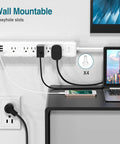 Wall-mounted two pack surge protector power strip with six outlets and four USB ports, angled flat plug, ideal for home office use.