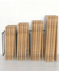 Hella Sturdy Portable Carton Storage Rack Cardboard Box Organizer with stacked cardboard boxes on a steel frame.