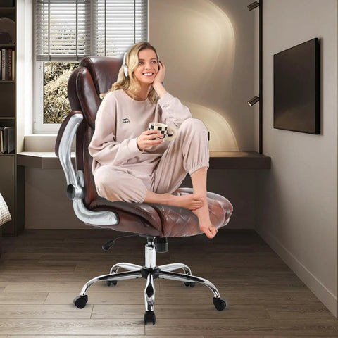 Woman seated on Big And Tall Leather Office Chair With Flip Up Arms High Back Executive Desk Chair On Wheels Brown
