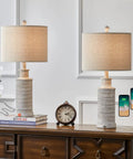 3 Way Dimmable Touch Control Table Lamp Set of 2 With USB Charging Ports for Bedroom and Living Room Vintage Rustic Farmhouse Nightstand Lamps Bulbs Included on wooden table.