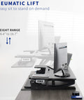 Image of Electric Height Adjustable Desk Converter With Sit To Stand Function And Dual Monitor Riser 42 Inch with pneumatic lift.