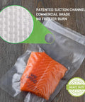 Heavy Duty 8x12 Inch Vacuum Sealer Bags 200 Count PreCut Quart With Cutter Box BPA Free with salmon inside on wood surface