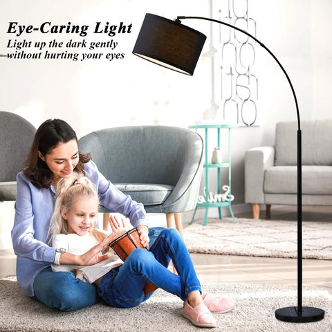 Arc Floor Lamp For Living Room With Fully Dimmable Stepless Brightness, No Fuss Adjustable Head, Tall Modern Black Standing Lamp Over Couch For Reading, Bedroom, Office, Bulb Included next to a mother and daughter sitting on the floor.
