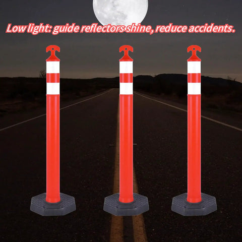Real McCoy Heavy Duty Traffic Delineator Posts With Weighted Rubber Bases And Bright Reflective Strips For Parking Lot Safety Markers Road Construction Warning Stakes 42 Inch Tall Six Pack Built Tough positioned at night.