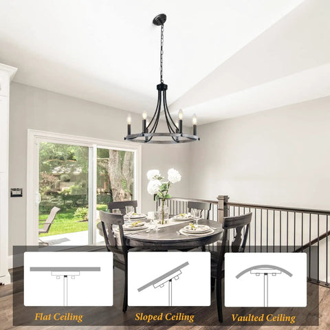 Farmhouse Wagon Wheel Chandelier 20 Inch Black Brown Iron With 6 Lights hanging over rustic dining table in bright room