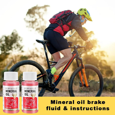 Cyclist with Dual Use Hydraulic Brake Bleed Kit For Road And MTB Bikes With M4 To M7 Adapters Mineral Oil Fluid And 2 X 60ml Bottles