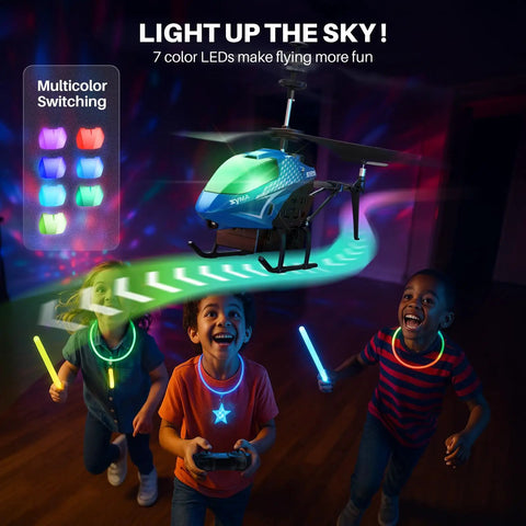 Kids playing with a Remote Control Helicopter With 40 Minute Flight Time And Auto Obstacle Avoidance Altitude Hold Dual Batteries. LED lights glowing.